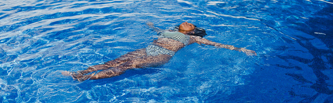 A woman floating in a lake